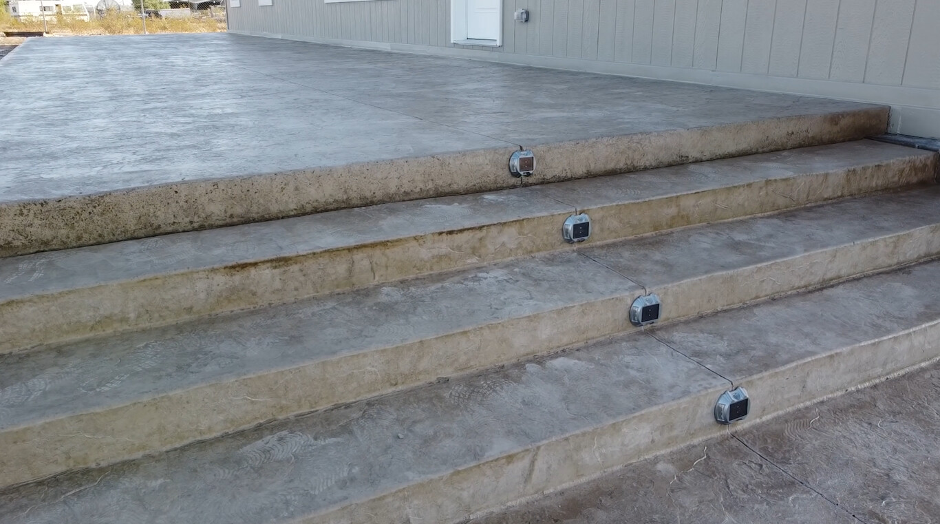 Restored concrete steps with modern lighting fixtures