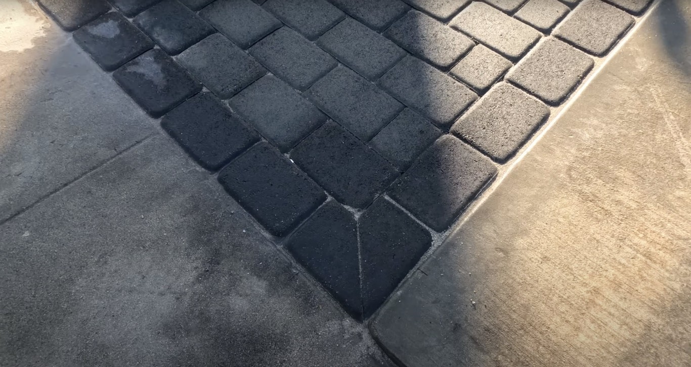 Close-up of stamped decorative concrete pavers with intricate pattern
