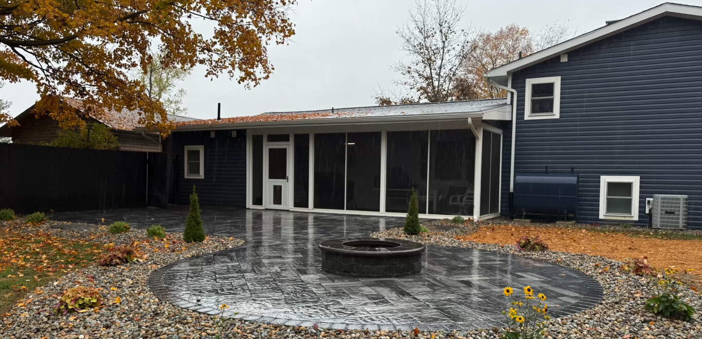 Beautiful stamped concrete patio with fire pit in Blue Springs, MO